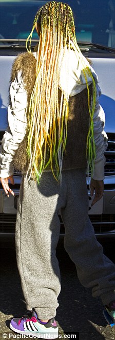 Fashion-forward Willow Smith steps up her style game as she reveals new waist-length neon hair braids - Willow Smith