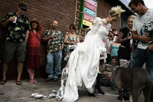 Sabrina Robertson shows off her "white trash" wedding dress compl...