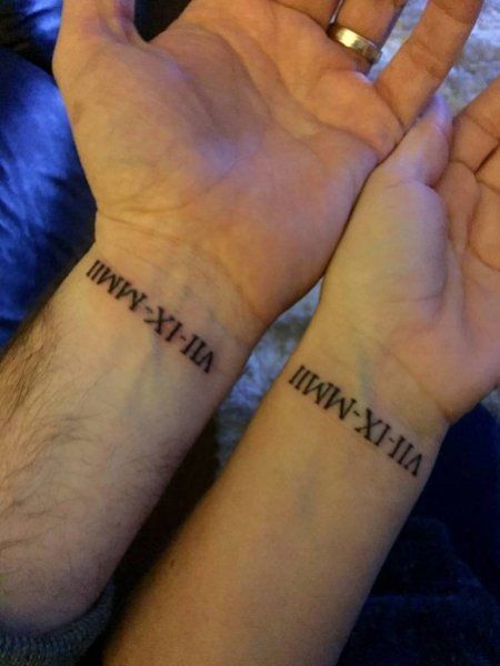 Tattoo uploaded by Aaron Turner  cover up this is a cover up of a  wedding date in Roman numerals The client was very particular about the  design and I loved the