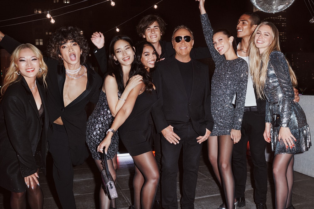 Michael Kors' Holiday 2021 Campaign Captures the Jet-Set Lifestyle With Bella Hadid & More